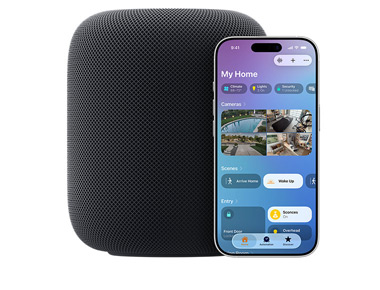 En HomePod i fargen midnatt med en iPhone som viser Mitt hjem-grensesnittet i Hjem-appen